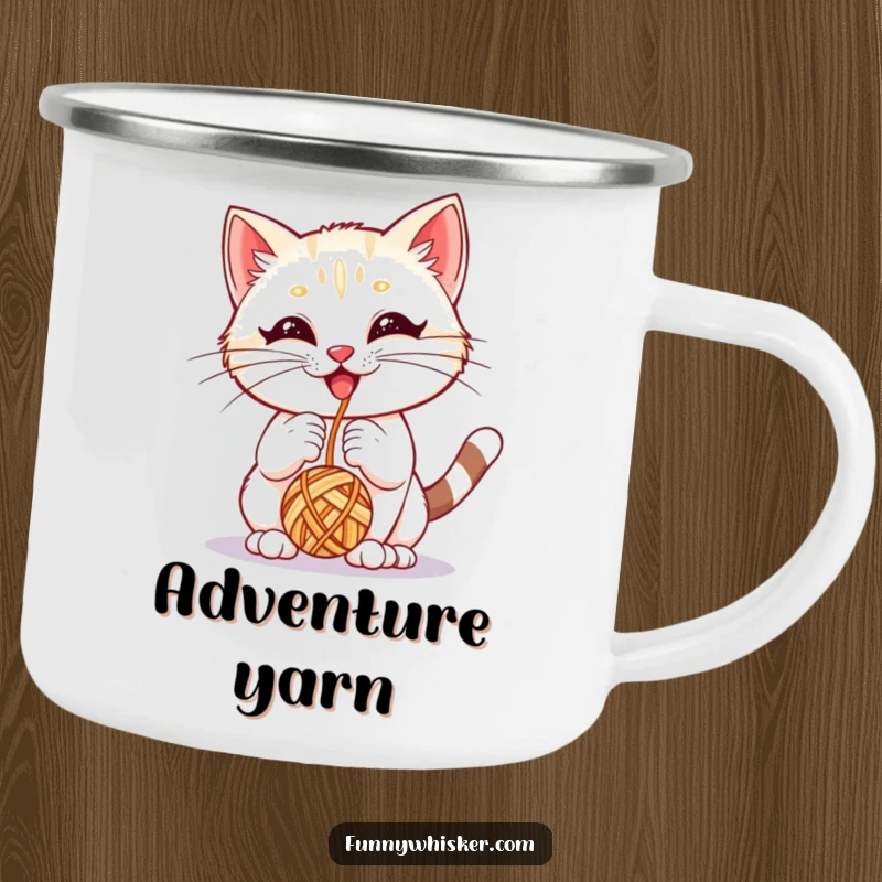 Funny enamel camping mug of a kitten with big whiskers playing with a yarn ball, perfect for outdoor fun.