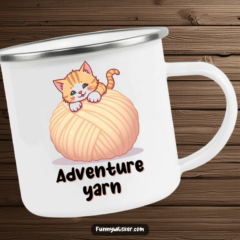 Funny camping mug of a cat pouncing on a ball of yarn, for adventurous cat lovers.