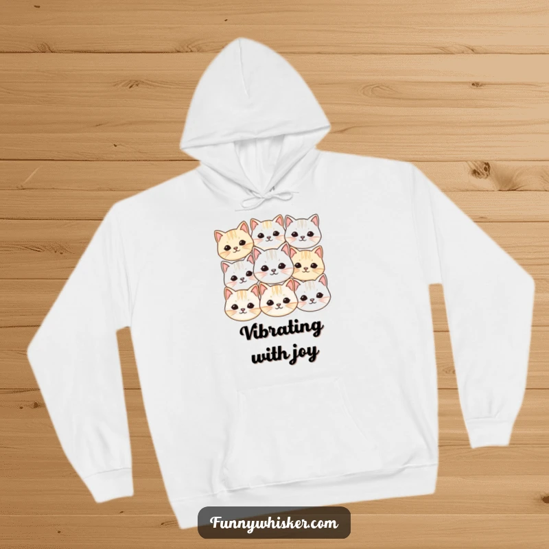 Funny hoodie featuring numerous small, round cat faces with vibrating whiskers, offering cozy comfort and an overload of cute humor.