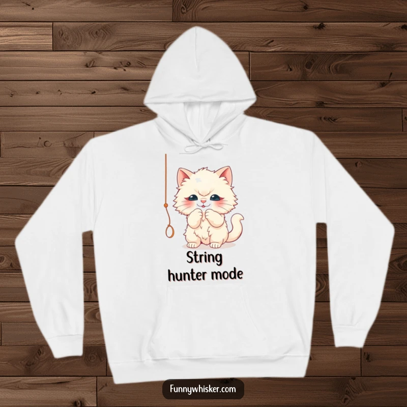 Funny hoodie featuring a fluffy cat character playfully batting at a dangling string. Cozy, humorous, and an excellent funny gift.