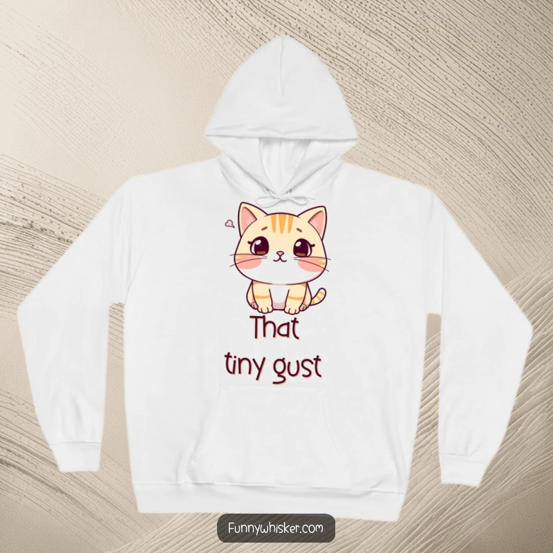 Funny cat hoodie depicting a character with a shocked expression, whiskers comically recoiling from a gentle puff of air, offering warm humor.