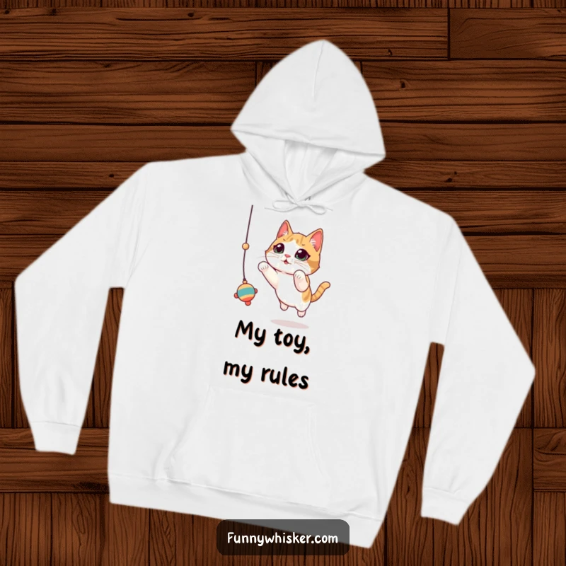 Funny Cat Hoodie: A cat with large, twitching whiskers leaps for a dangling toy, a humorous and warm garment.