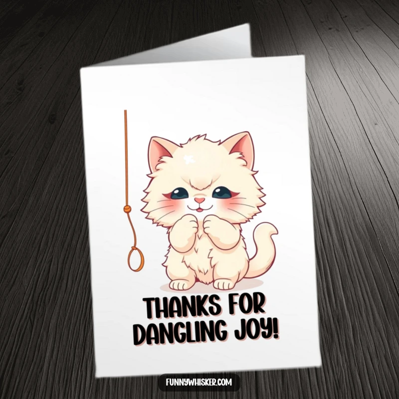 Funny Free Printable Thank You Card: A fluffy cat character is shown enthusiastically batting at a dangling string, a sweet thank you.