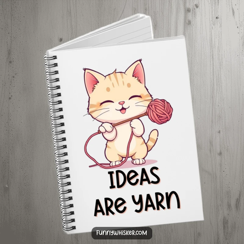 Funny Notebook: A cat character playfully batting at a fuzzy ball of yarn on the cover.