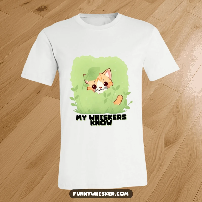 Funny peeking cat t-shirt with only twitching whiskers visible behind a bush, perfect for stealthy humor.