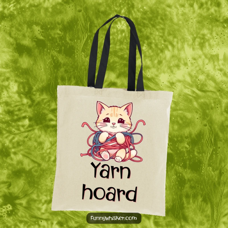 Funny tote bag featuring a mischievous cat character caught in a yarn tangle, whiskers askew, ideal for shopping and humor.